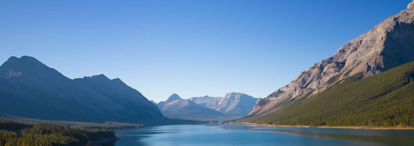 View of a lake surrounded by rocky mountains