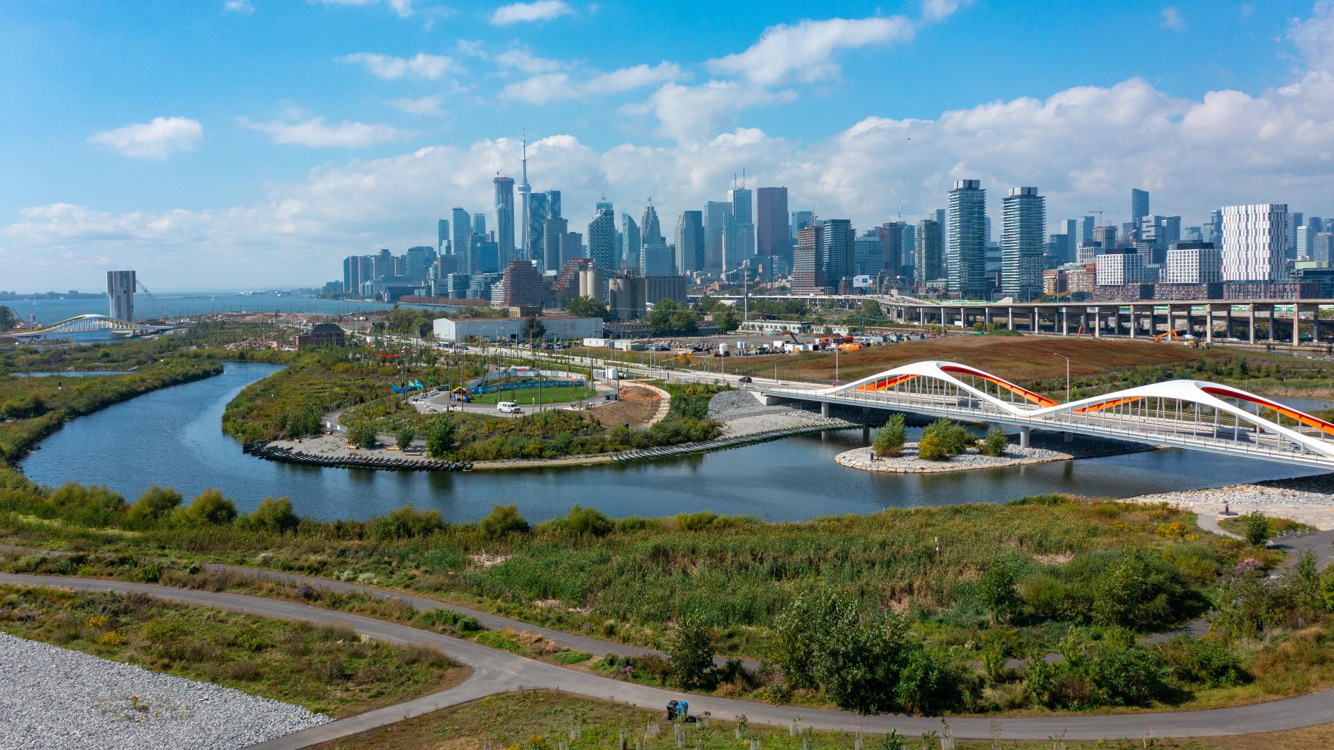 A bridge running across a river at the Port Lands on Toronto's waterfront