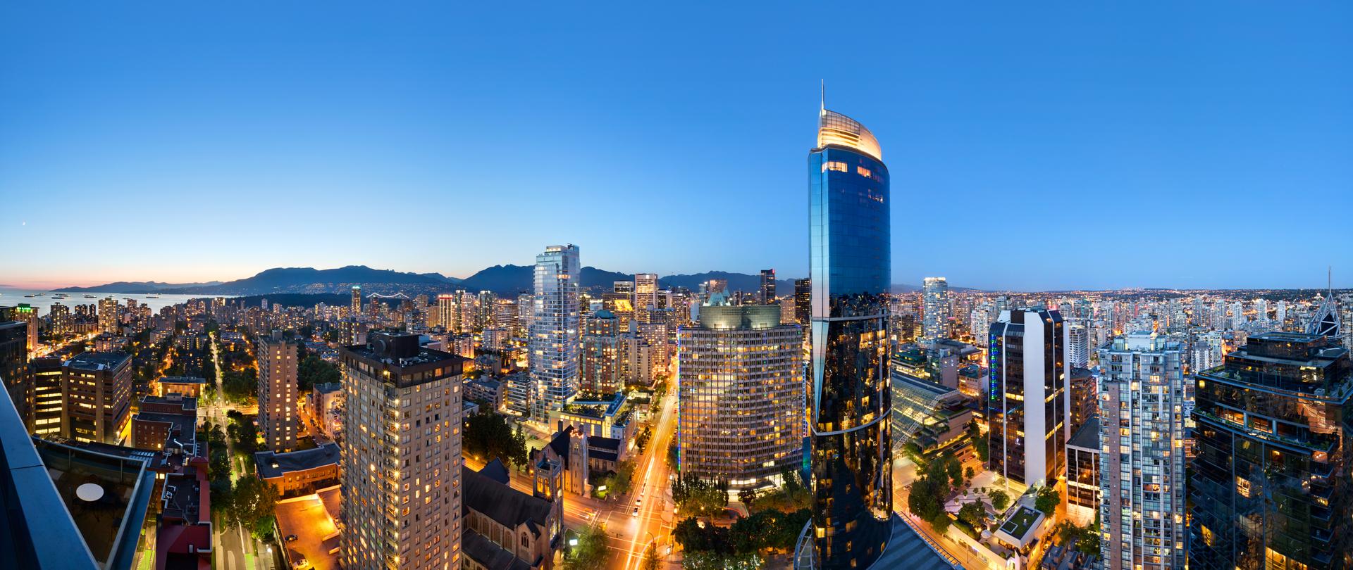 The Vancouver skyline at twilight with the Sheraton Wall Center featured.