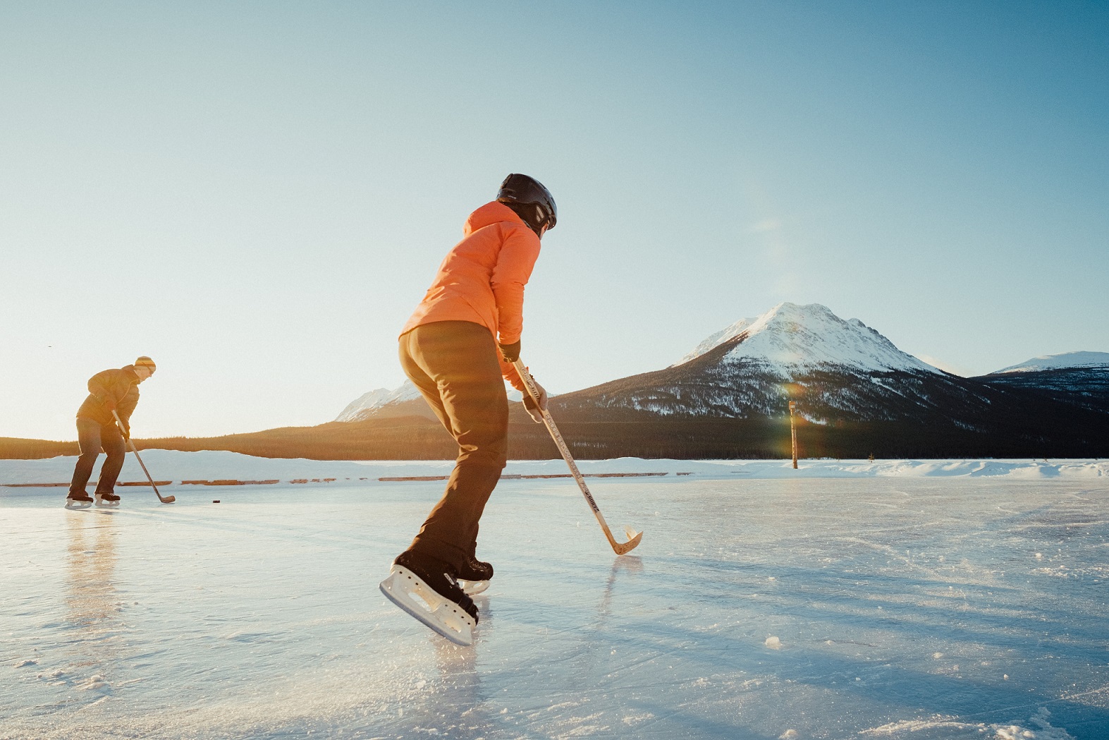 People playing ice hockey in Whitehorse