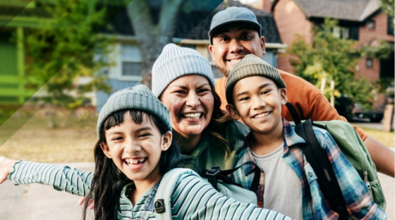 A family smiling for a photo